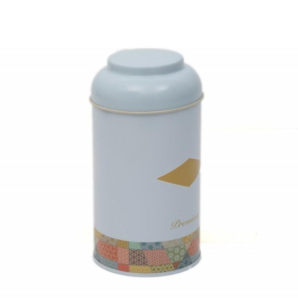 Ø90 x 150 mm Yuvarlak Metal Teneke Kutu – 0,9 L, Kubbeli Kapaklı, Yama Desenli, Mavi Arka Planlı — Yuvarlak Kutular — görs…